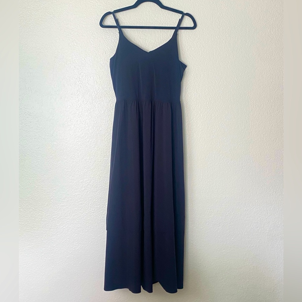 Black Athleta sporty dress with pockets and built-in bralette.